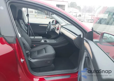 2024 Tesla Model Y z USA, uszkodzony, nr VIN 7SAYGDED5RA326294
